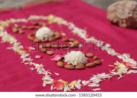 create 2020 with almonds and flowers on pink background