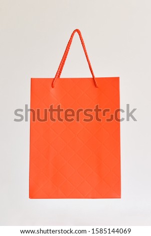 empty blank craft paper shopping bag on a white background. Packaging template mockup
