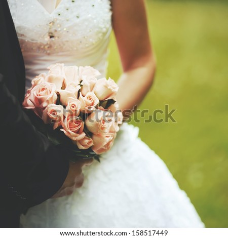 Bride and groom holding hands. Wedding. Royalty-Free Stock Photo #158517449