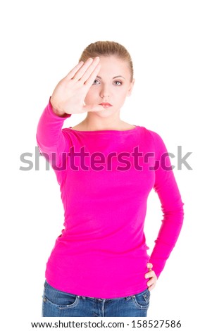 Hold on, Stop gesture showed by young woman hand 
