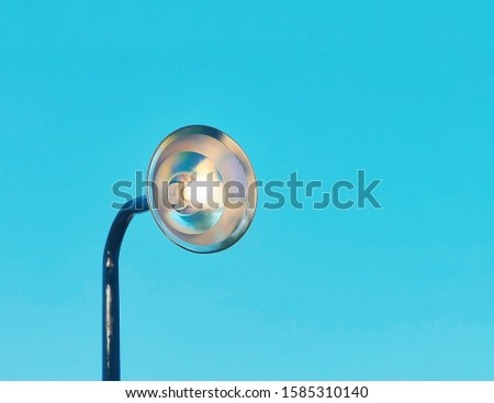 modern lamp on blue skey background