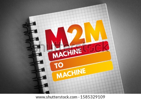 M2M - Machine to Machine is direct communication between devices using any communications channel, including wired and wireless, acronym text concept on notepad