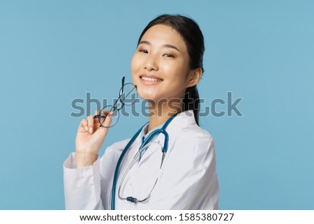 Female doctor medicine professional work treatment white coat