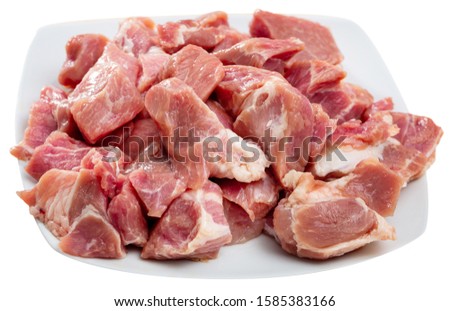 Close up of raw pork slices, nobody. Isolated over white background