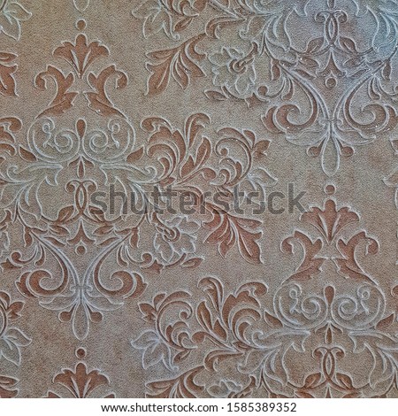 Ceramic tile with floral pattern for wall decor. Concrete stone surface background. Oriental texture with ornament for interior design project.