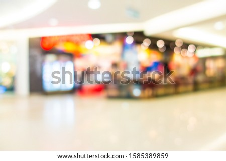 Abstract blur shopping mall in department store interior for background