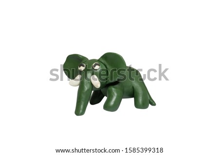 Statues like cute animals for children. Molding from plasticine. Cartoon characters, Elephant isolated on white background with clipping path.