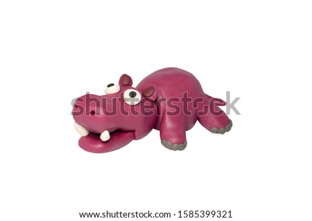 Statues like cute animals for children. Molding from plasticine. Cartoon characters, Hippopotamus isolated on white background with clipping path.