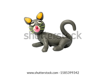 Statues like cute animals for children. Molding from plasticine. Cartoon characters, Cat isolated on white background with clipping path.