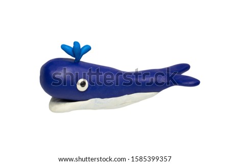 Statues like cute animals for children. Molding from plasticine. Cartoon characters, Whale isolated on white background with clipping path.