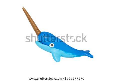 Statues like cute animals for children. Molding from plasticine. Cartoon characters, Narwhal isolated on white background with clipping path.