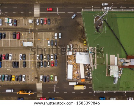 Aerial view. Open-air car parking.