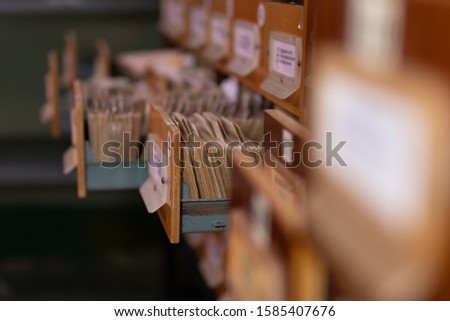 Catalogues in the library with drawers and cards for finding books and information