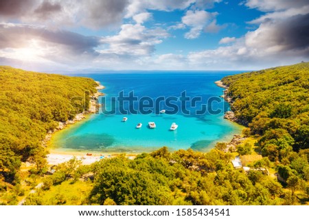 Aerial drone photo of tropical coast. Location place Cres, Kvarner bay, Croatia, Europe. Breathtaking shot over the sea. Drone photography of popular tourist attraction. Discover the beauty of earth.