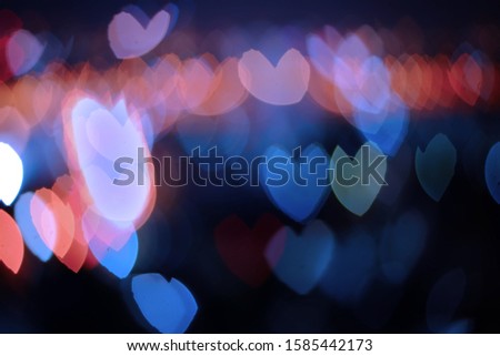 Abstract blurred heart bokeh lights backgrounds, Colorful blurred bokeh of city night light