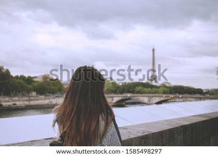 Paris, France
September 28
A girl next to the Seine River with views to the Eiffel Tower.