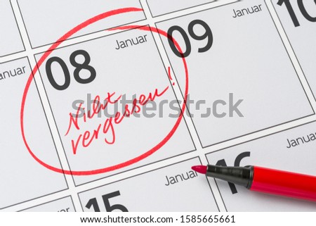Save the Date written on a calendar - January 08 -  Nicht vergessen in german