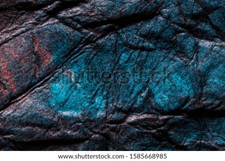 multicolored textured paper surface macro close up