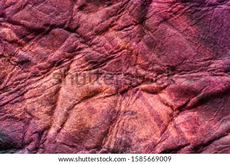 multicolored textured paper surface macro close up