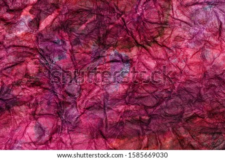 purple colored rough paper macro close up