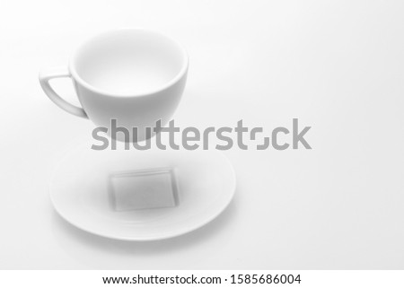 flying cup of coffee on white background studio shot
