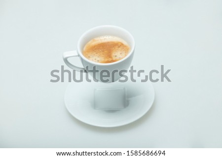 flying cup of coffee on white background