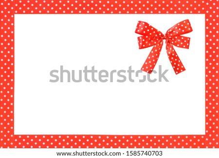 Realistic red fabric frame with ribbons, with a bow. Isolated on white background