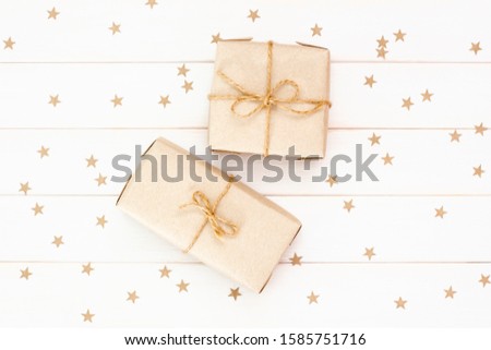 Gifts and confetti on white background. Present boxes.