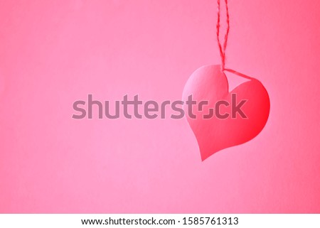 Valentine paper craft design, contain pink heart sting on top, soft pink background feel fluffy in the air, Happy Valentine's day concept. Copy space.