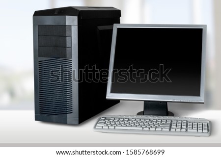 Modern desktop computer and keyboard on desk