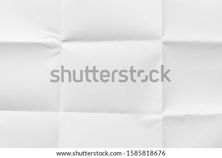 New blank paper folded in nine, texture background