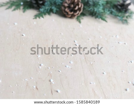 Christmas wallpaper on wooden background with space for your logo and text