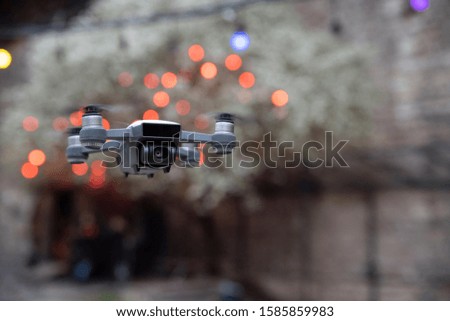 drone flies in the city