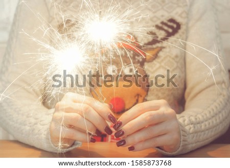 
the girl in the hands of sparklers 
Christmas