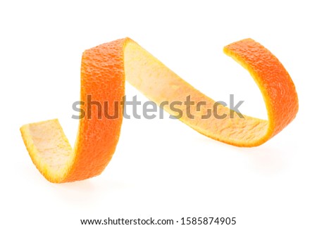 Orange peel in shape of spiral isolated on a white background. Beauty health skin concept.