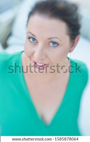 Mid adult woman smiling, portrait