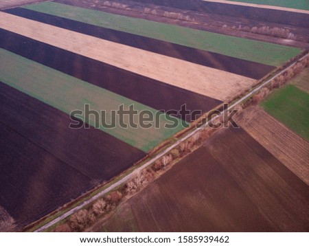Aerial drone image view of plowed field in Hungary