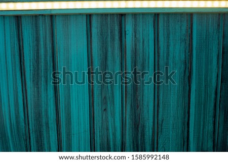Light blue and green aquamarine dirty and grunge wooden panels texture. Closeup detailed texture. Texture, wallpaper, The texture of the board painted green