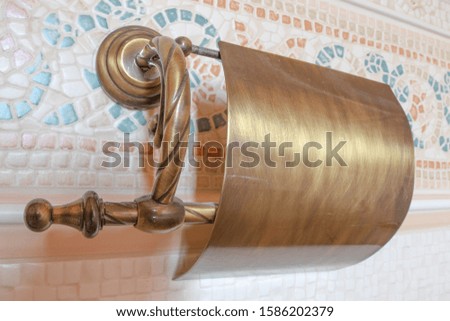 
toilet paper holder made of bronze