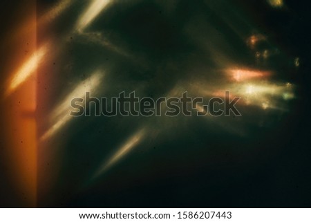 Background of retro film overly, image with scratch, dust and light leaks Royalty-Free Stock Photo #1586207443