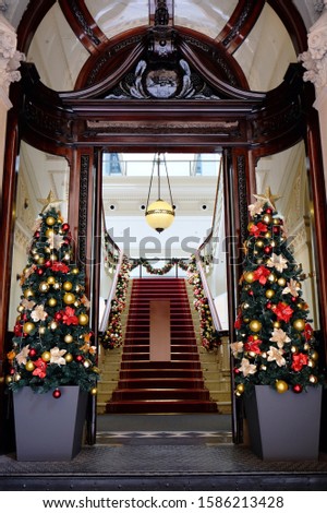 Hall decorations to Christmas holidays, beautiful historical building with strairs