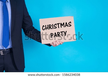 businessman with christmas party poster