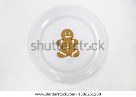 Gingerbread is a cake made from cookie dough mixed with spices such as ginger and cinnamon and is usually served at Christmas.