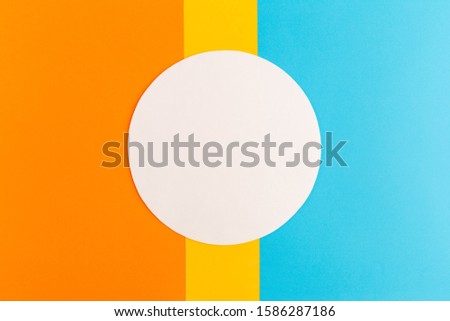 Abstract colored paper and creative colorful bright paper background, white circle for text