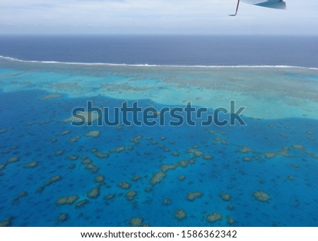 Beautiful Turquoise Blue Lagoon of New Caledonia with coral reefs, seen from above