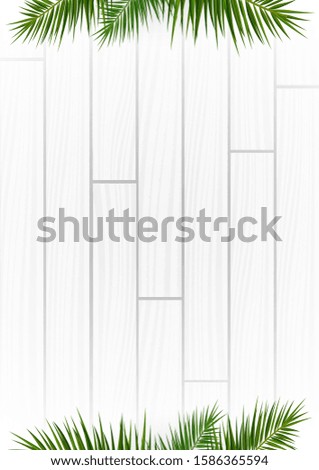 White Wooden background with exotic palm leaves