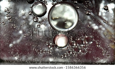 The circle from oil drops on the water surface is used as a background image.
