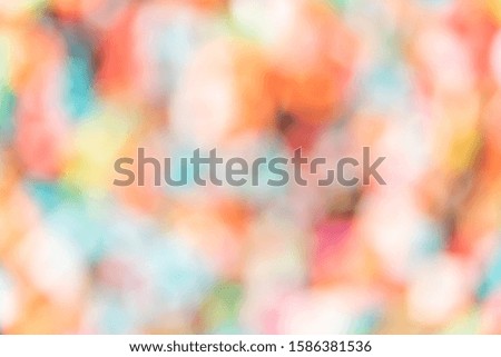 Abstract colorful bokeh background for design work.