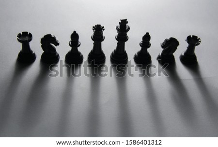 Top angle silhouette of chess pieces. Black chess pieces. Game of chess