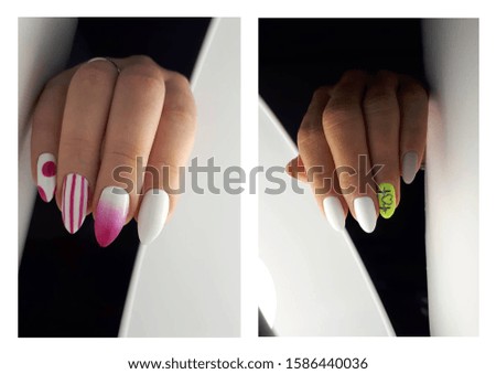 white nails with pink and yellow with design